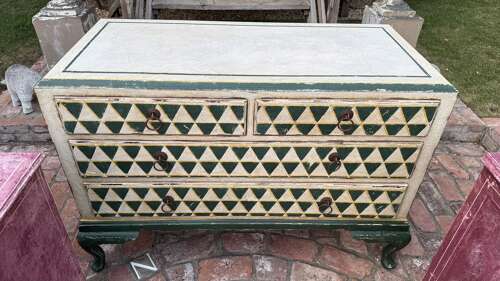 This piece has found its new home, but a similar Green Triangles chest can be created